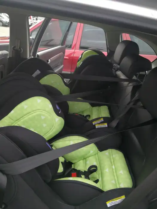 Fitting In Three Child Restraints Across The Back Seat 5 three across back seat